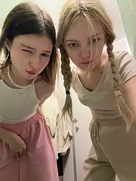 Elsawhere - Elsa's hands under Nancy's top....