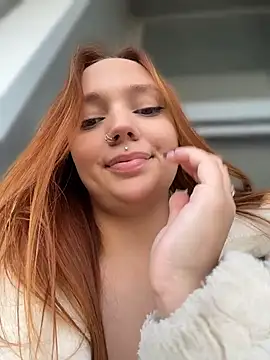 LisaCatt - sucking fingers topless