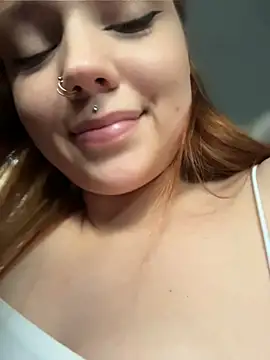 LisaCatt - sucking fingers topless