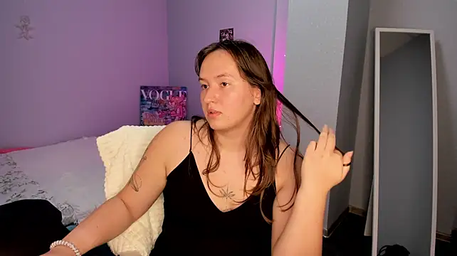 Nika-Vale - Teasing her breasts in a tank top