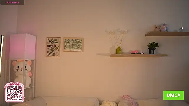 Bellacle - naughty pose by the couch panties flash