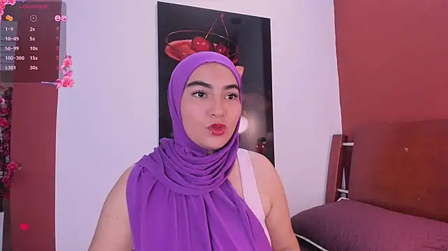 Malika_Noor - I rub my ass and it throbs.