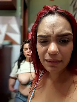 Sara-77 - They oil up and lick each other's tits.