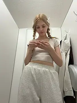 Elsawhere - pants on knees in men's public WC