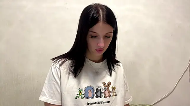 LalaSchwarting - show mini tattoo on boobs
