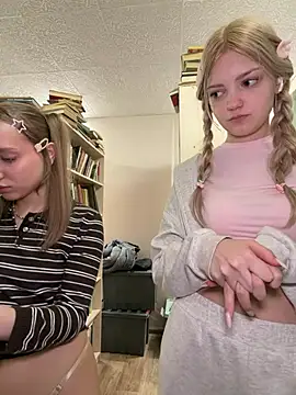 Elsawhere - both show yummy underboobies!