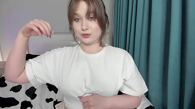 JennyHardy - doggy pose on the bed