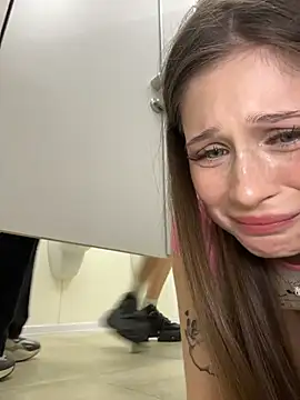 Sukidaa - Anal tease both near urinals on knees