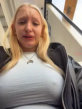 Elfi_InPublic - Pinch nipples under top in full bus