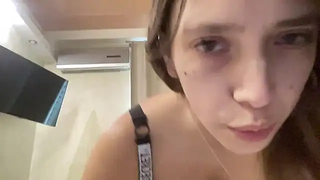 CapriceBaby - eating cream topless