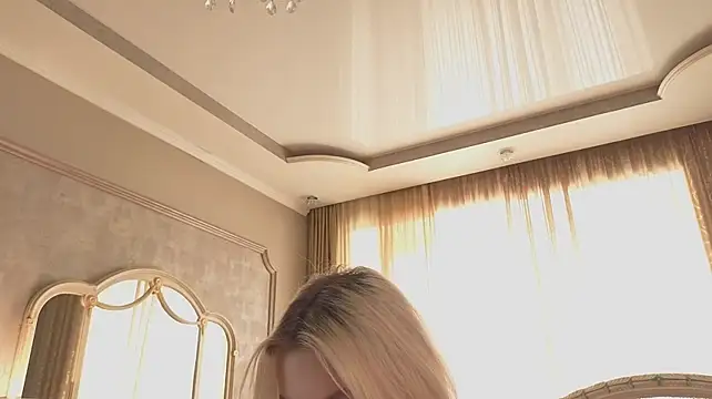 MercedezTimbs - Tie a T-shirt in a bow showing more body