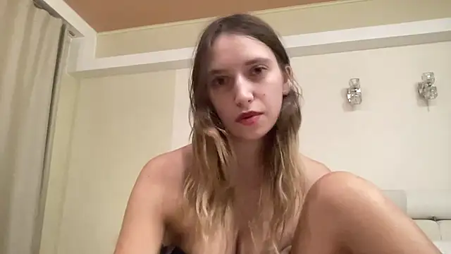 CapriceBaby - eating cream topless